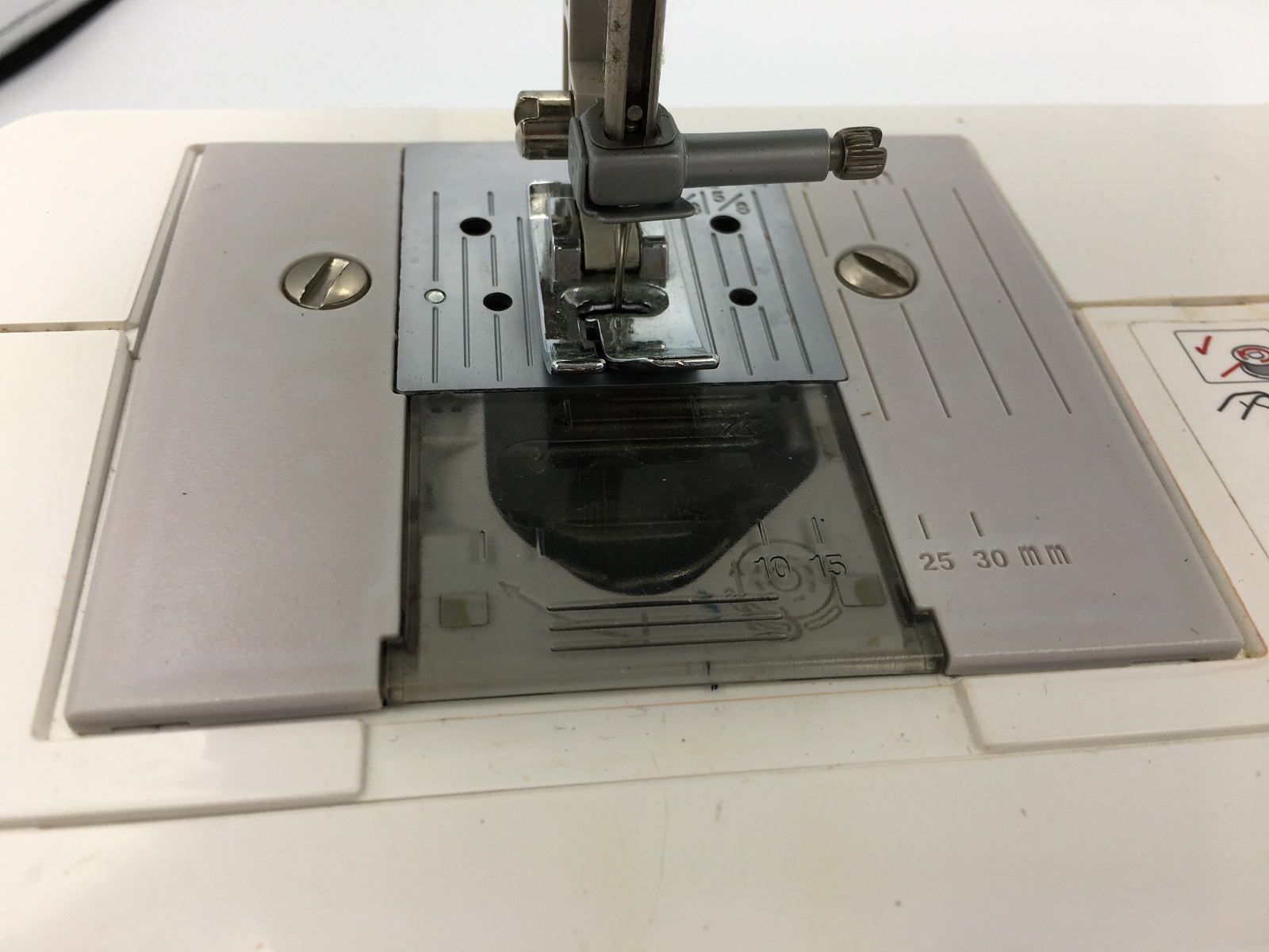 Needle Plate Screw XE9735001